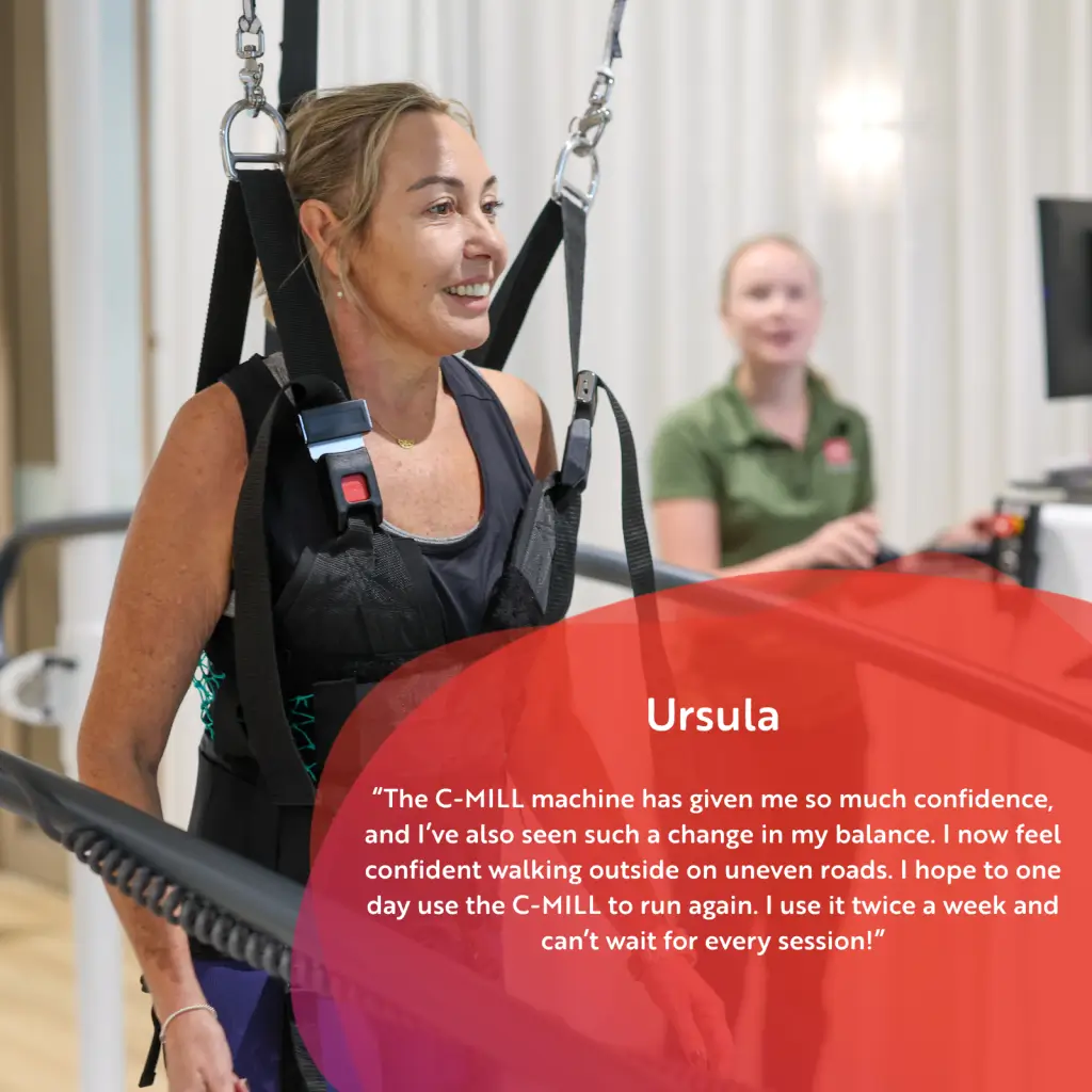 A woman smiles while using a harness on a treadmill in a therapy setting. Another woman sits in the background. A testimonial about improved confidence and balance with the C-MILL machine is displayed in a red text box.